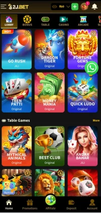 2J Bet Game screen showing more popular games including Go Rush, Dragon Tiger, and Fortune Gems with category tabs.